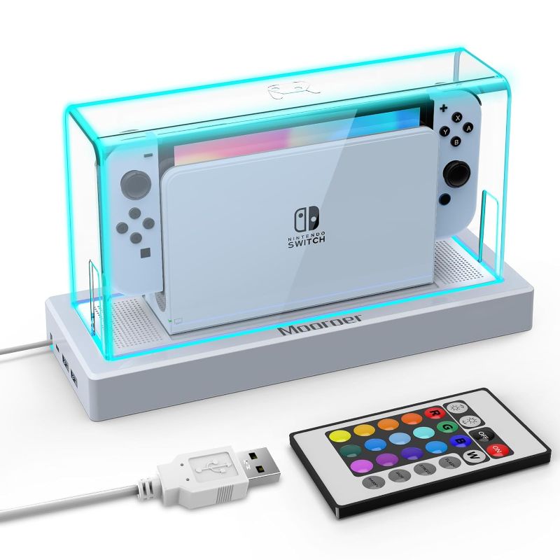 Photo 1 of **MINOR SCRATCHES**
Mooroer Dust Cover with 16 LED Colors Light Base for Nintendo Switch/OLED, Acrylic Clear Display Box Anti-Scratch Waterproof Slim Dock Case, Cool Switch Accessories