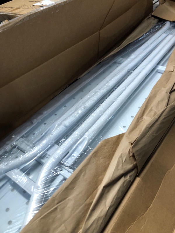 Photo 1 of Amazon Basics Full-Size Ironing Board - 4-Leg Fold-Up, Chevron Removable Cover