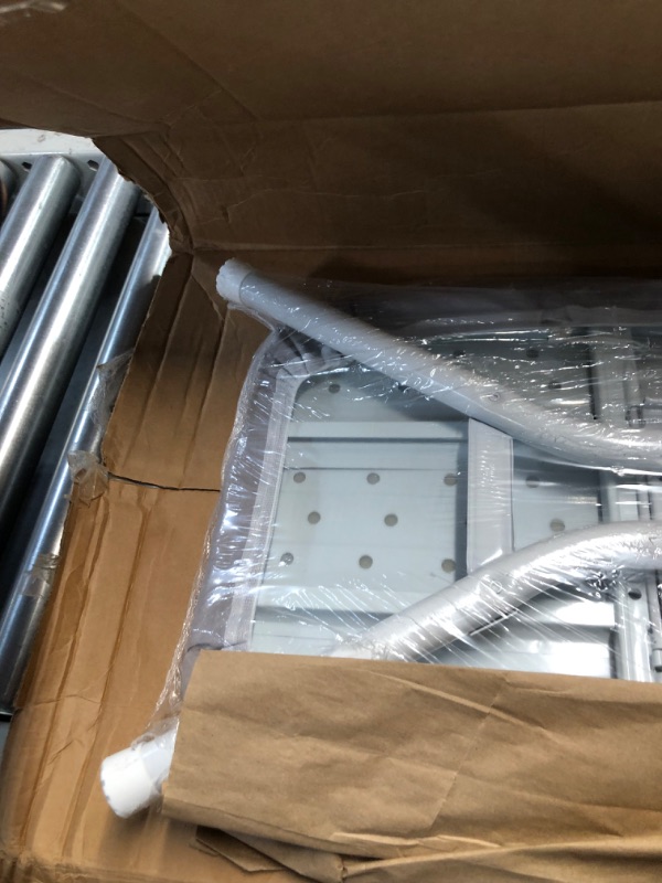 Photo 1 of Amazon Basics Full-Size Ironing Board - 4-Leg Fold-Up, Chevron Removable Cover