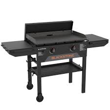 Photo 1 of **door won't stay on, prev used, very dirty***Blackstone 28" Griddle Value Bundle 2-Burner Liquid Propane Flat Top Grill
