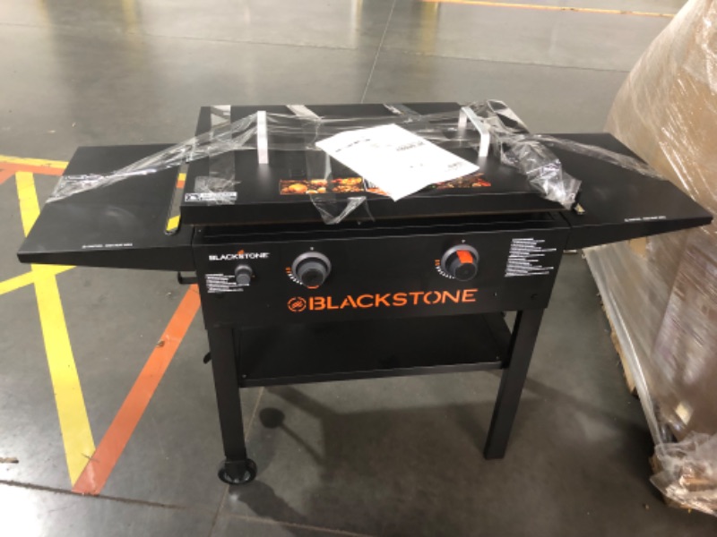 Photo 10 of **door won't stay on, prev used, very dirty***Blackstone 28" Griddle Value Bundle 2-Burner Liquid Propane Flat Top Grill
