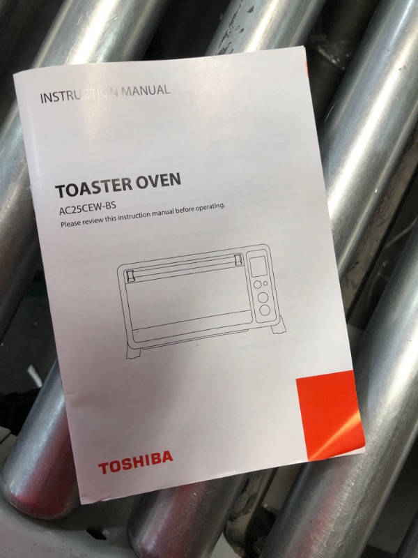 Photo 7 of **dented on the side powers on** TOSHIBA AC25CEW-BS Large 6-Slice Convection Toaster Oven Countertop, 10-In-One with Toast, Pizza and Rotisserie, 1500W, Black Stainless Steel