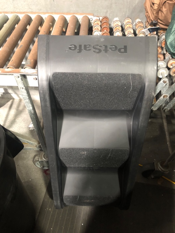 Photo 1 of ***DAMAGED - BASE BROKEN - SEE COMMENTS***
PetSafe Happy Ride Side Door Pet Steps for Cars and SUVs - Foldable Dog Stairs Grant Pets Access to Back Seat - Stable Design - 3 Heights for Most Vehicles - Supports up to 200 Pounds