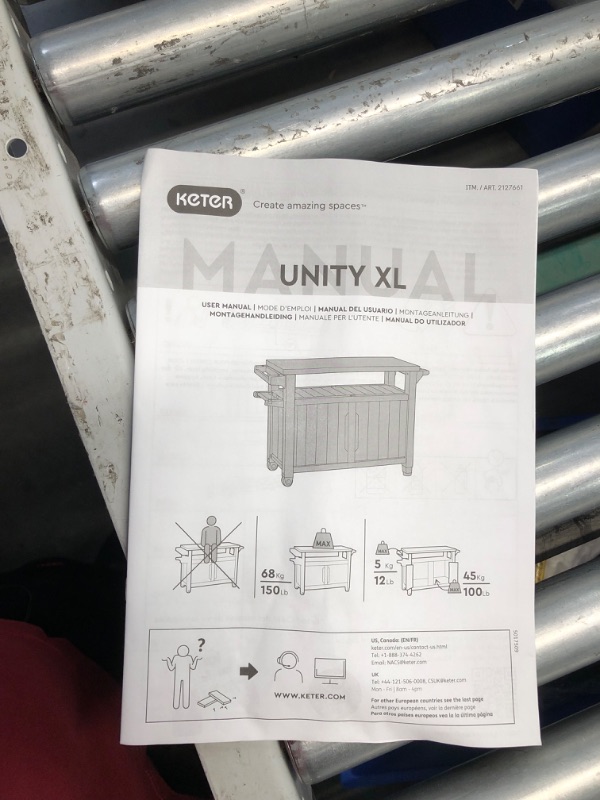 Photo 5 of ***USED - LIKELY MISSING PARTS - UNABLE TO VERIFY FUNCTIONALITY***
Keter Unity XL Portable Outdoor Table with Stainless Steel Top for Kitchen Prep and Outdoor Storage Cabinet for Grilling Accessories, Dark Grey