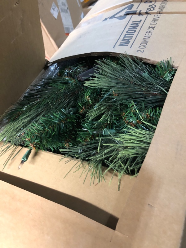 Photo 2 of **READ NOTES, MINOR DAMAGE**
National Tree Company Carolina Pine 7.5 Foot Artificial Holiday Prelit Christmas Tree w/750 Clear Lights, Pinecones, 1399 Branch Tips and Metal Stand