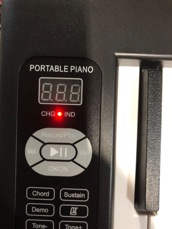 Photo 2 of ***USED - POWERS ON - UNABLE TO TEST FURTHER - LIKELY MISSING PARTS***
Finger Dance 61 Key Keyboard, Folding Piano, Semi Weighted Keys Portable Piano, Bluetooth & MIDI, Foldable Keyboard Piano for Beginner - Deep Black