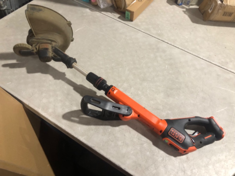 Photo 4 of ***USED - NO BATTERY - UNABLE TO TEST - VERY DIRTY***
BLACK+DECKER 20V MAX String Trimmer, 2-Speed, 12-Inch, Cordless (LST522) 20V String Trimmer Kit