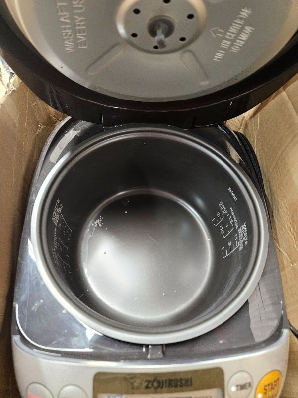 Photo 3 of ***USED*MINOR DAMAGE*SCUFFS FROM WEAR***
Zojirushi NS-TSC10 5-1/2-Cup (Uncooked) Micom Rice Cooker and Warmer, 1.0-Liter 5.5 cups Rice Cooker