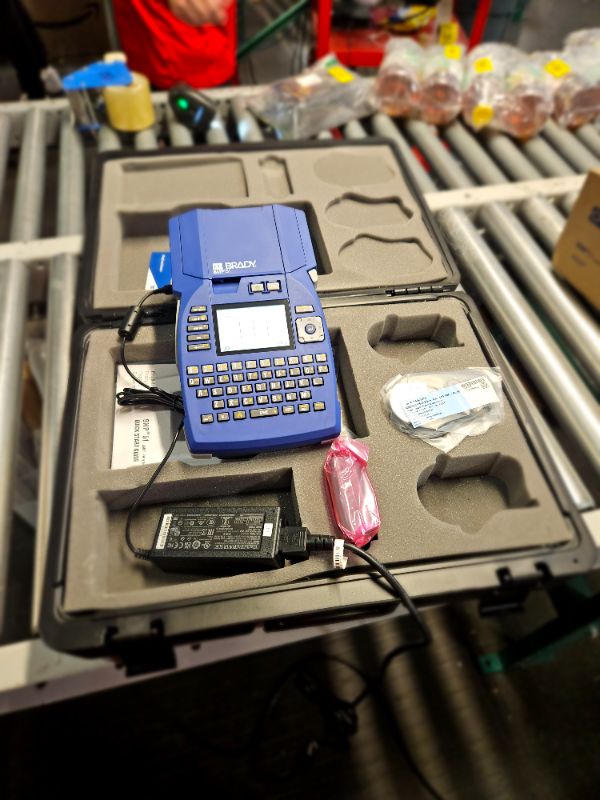 Photo 2 of **MAY BE MISSING PIECES**
Brady M710 Portable Label Printer with Hard Case (M710-KIT). Fastest, Most Advanced Portable Printer That Prints on The Toughest Labels., Large, Blue