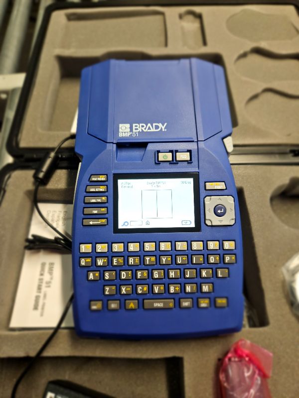 Photo 3 of **MAY BE MISSING PIECES**
Brady M710 Portable Label Printer with Hard Case (M710-KIT). Fastest, Most Advanced Portable Printer That Prints on The Toughest Labels., Large, Blue