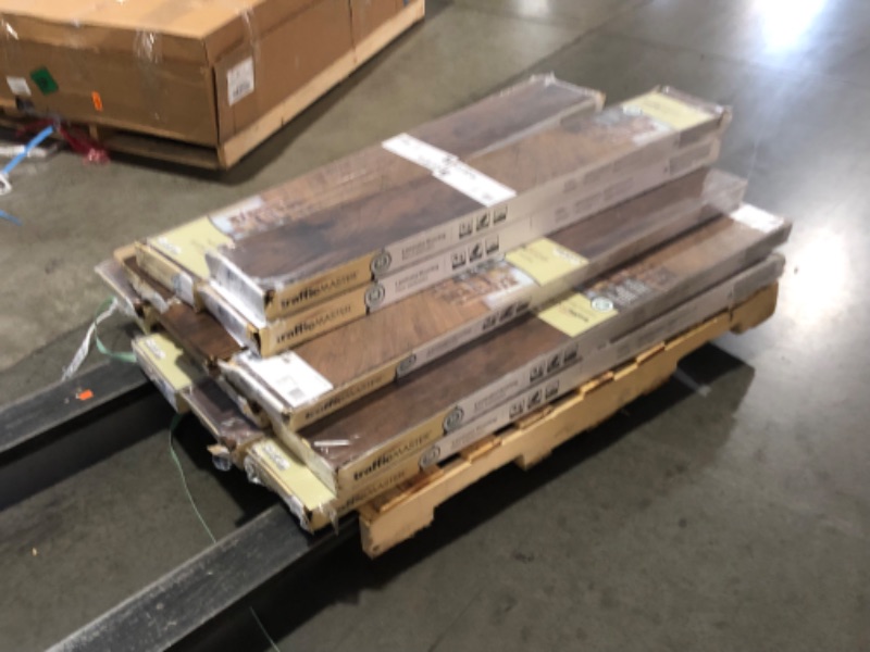 Photo 1 of  NOT REFUNDABLE pallet of 14 flooring boxes (10 24.17 sq ft floorings  