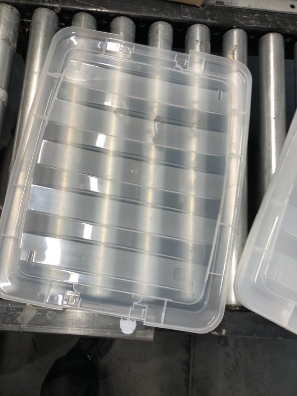 Photo 2 of **DAMAGE** IRIS USA 40 Qt. Plastic Storage Bin Container with Durable Lid and Secure Latching Buckles, 4-Pack, Sturdy Stackable Nestable Organizer Tote with Pull Handle for Easy Access and Storage, Clear 40 Qt. - 4 Pack Clear - 3 lids damaged 