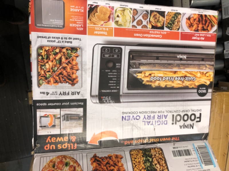 Photo 7 of ***MAJOR DAMAGE - SEE COMMENTS - UNABLE TO TEST***
Ninja SP101 Digital Air Fry Countertop Oven with 8-in-1 Functionality, Flip Up & Away Capability for Storage Space, with Air Fry Basket, Wire Rack & Crumb Tray, Silver 8 Functions Silver & Black