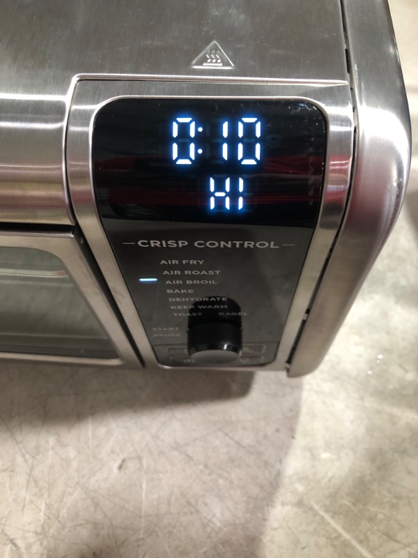 Photo 11 of ***MAJOR DAMAGE - SEE COMMENTS - UNABLE TO TEST***
Ninja SP101 Digital Air Fry Countertop Oven with 8-in-1 Functionality, Flip Up & Away Capability for Storage Space, with Air Fry Basket, Wire Rack & Crumb Tray, Silver 8 Functions Silver & Black