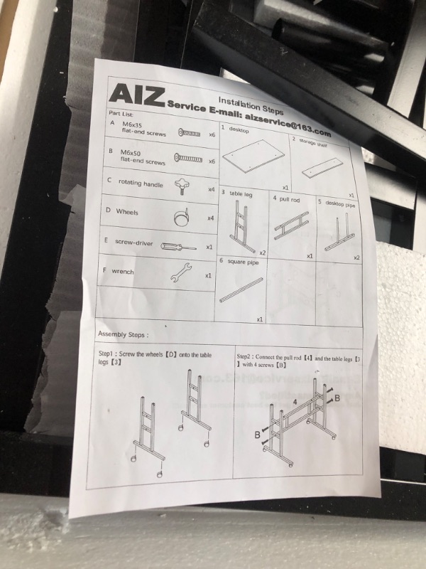 Photo 1 of AIZ Mobile Standing Desk, Adjustable Computer Desk Rolling Laptop Cart on Wheels Home Office Computer Workstation, Portable Laptop Stand Tall Table for Standing or Sitting, Black 31.5" x 19.7"