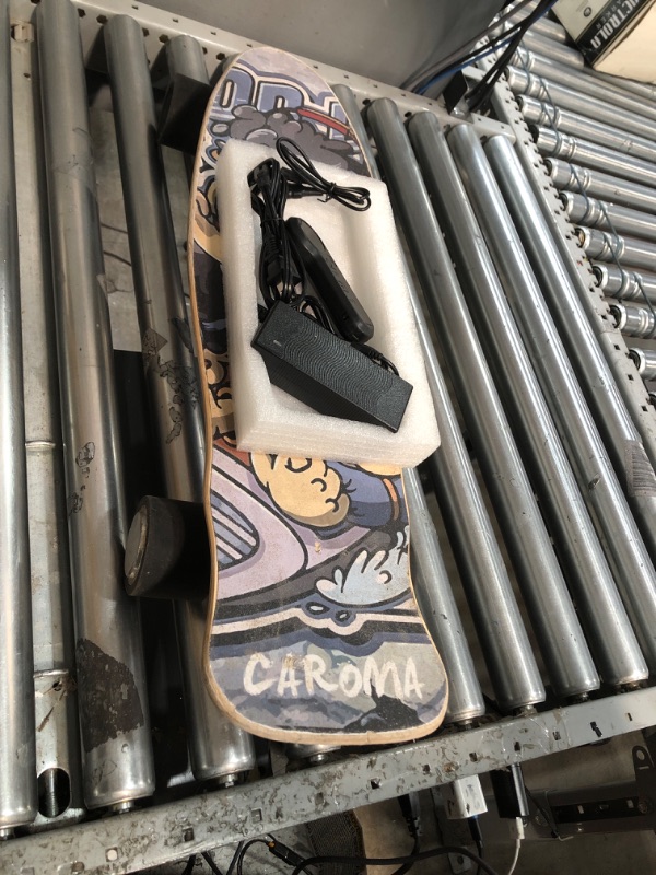 Photo 1 of electric skateboard with controller