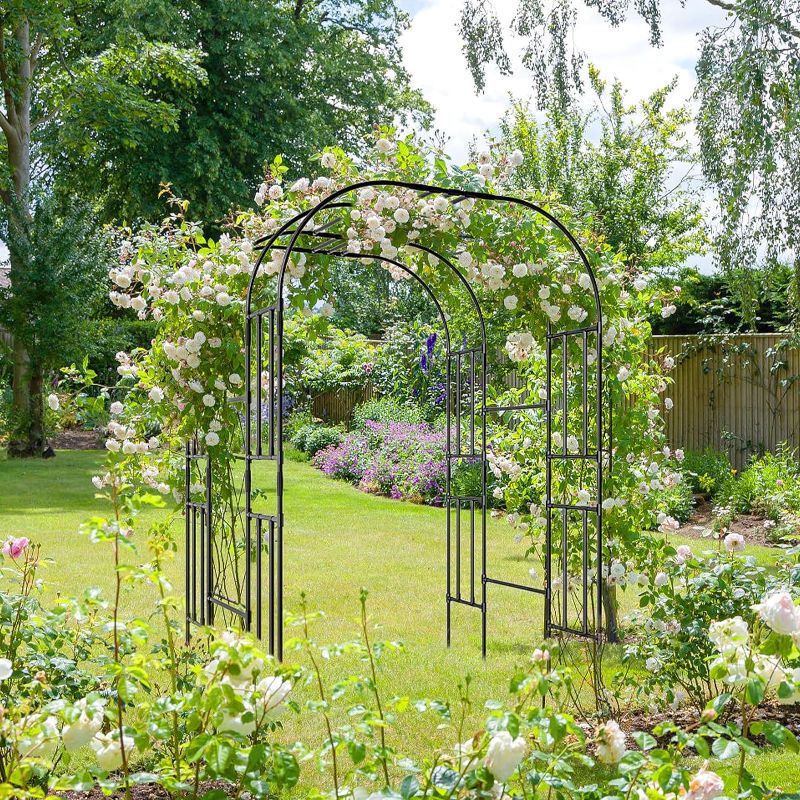 Photo 1 of (READ FULL POST) UrGROWA Garden Arch Arbor Trellis, 87" Tall Metal Archway Garden Trellis for Climbing Plants, Wide Sturdy Durable Garden Arch for Lawn, Party, Ceremony Wedding Decoration