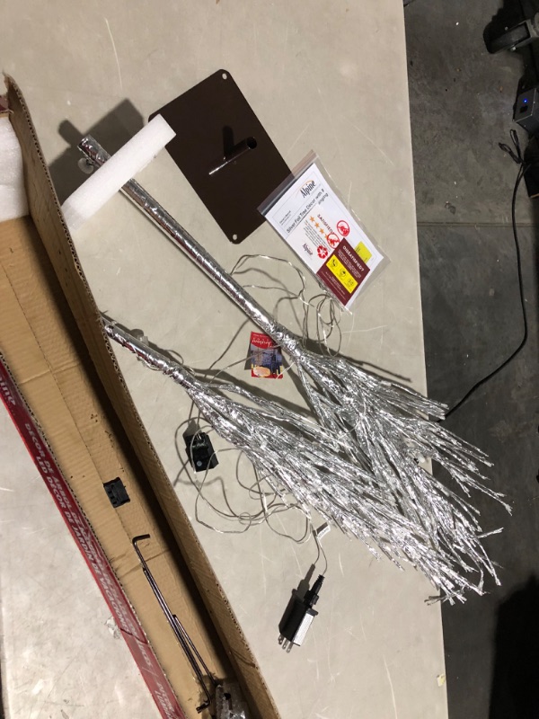 Photo 5 of ***MAJOR DAMAGE - NOT FUNCTIONAL - FOR PARTS ONLY - NONREFUNDABLE - SEE COMMENTS***
65 in. H Indoor/Outdoor Pre-Lit Silver Foil Christmas Tree with Yard Stake and 360 LED Lights