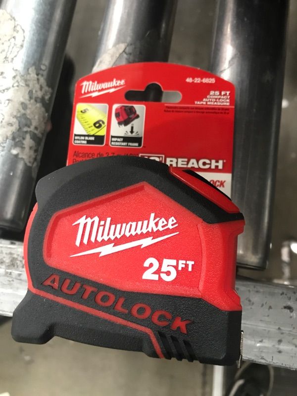 Photo 2 of milwaukee compact auto lock 25 ft. sae tape measure with fractional scale and 9 ft. standout