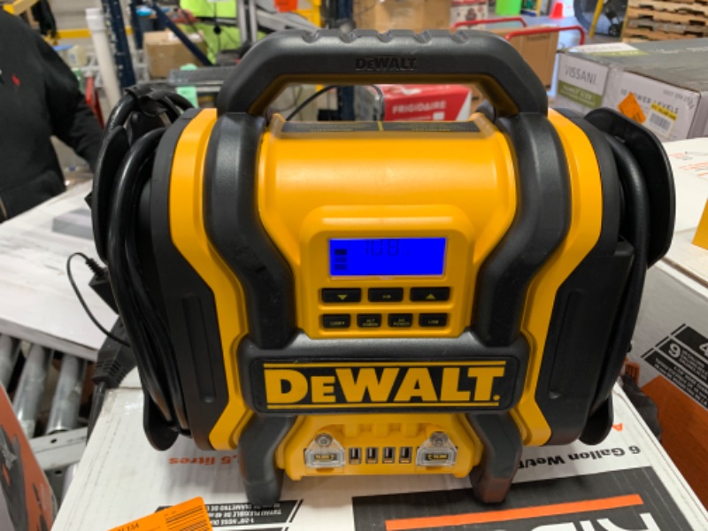 Photo 2 of DEWALT DXAEPS14 1600 Peak Battery Amp 12V Automotive Jump Starter/Power Station with 500 Watt AC Power Inverter, 120 PSI Digital Compressor, and USB Power , Yellow