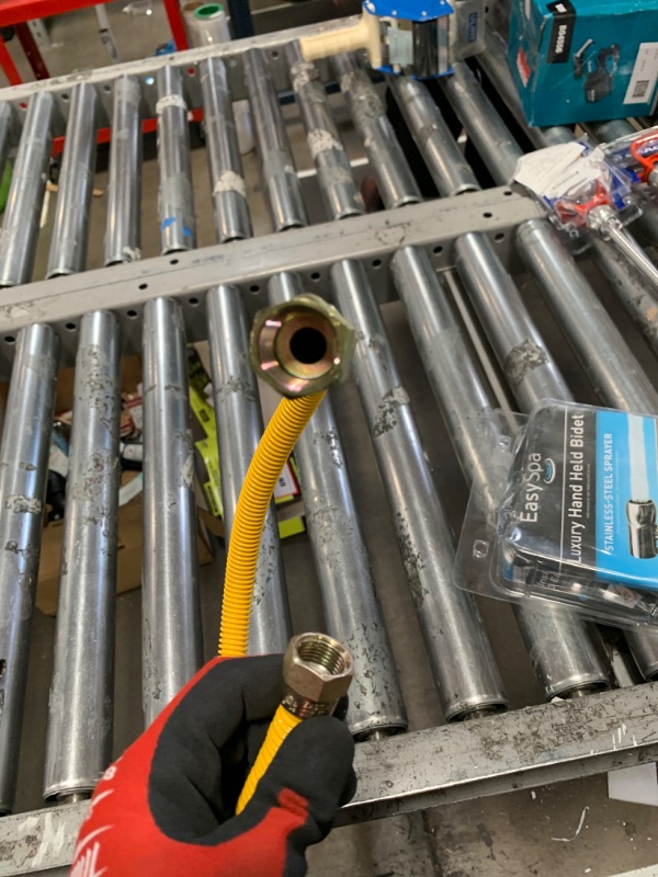 Photo 1 of Eastman 36 Inch x 3/8 Inch OD Flexible Gas Line Connector with (2) 1/2 Inch MIP Fitting Ends for Natural Gas and Liquid Propane, Stainless Steel, Yellow, 10YE505036B 36 in. Yellow