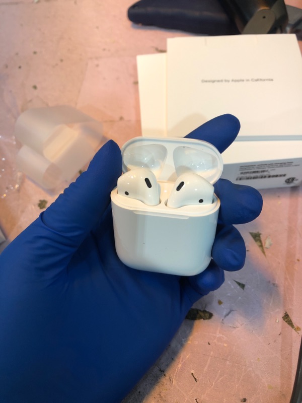 Photo 1 of AirPods with Charging Case