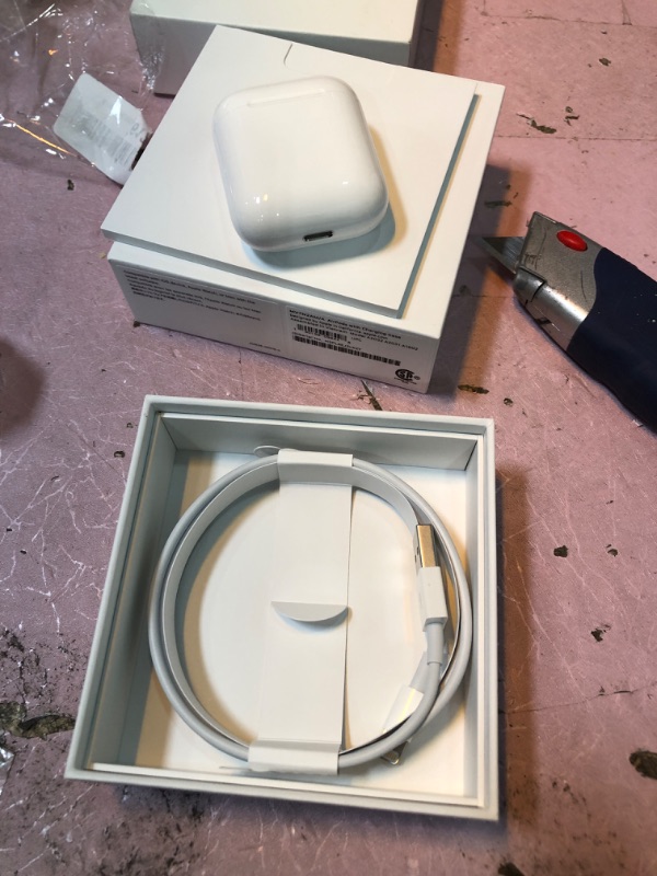 Photo 1 of AirPods with Charging Case