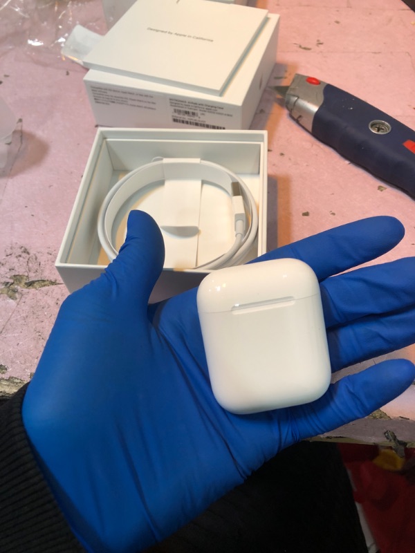 Photo 1 of AirPods with Charging Case