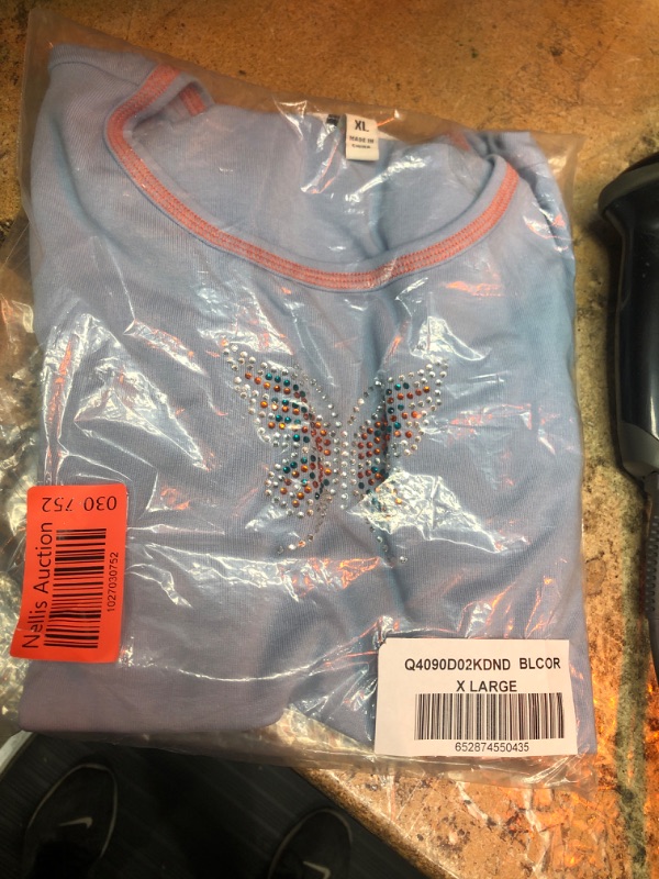 Photo 1 of BLUE XL T SHIRT WITH RHINESTONE BUTTERFLY 