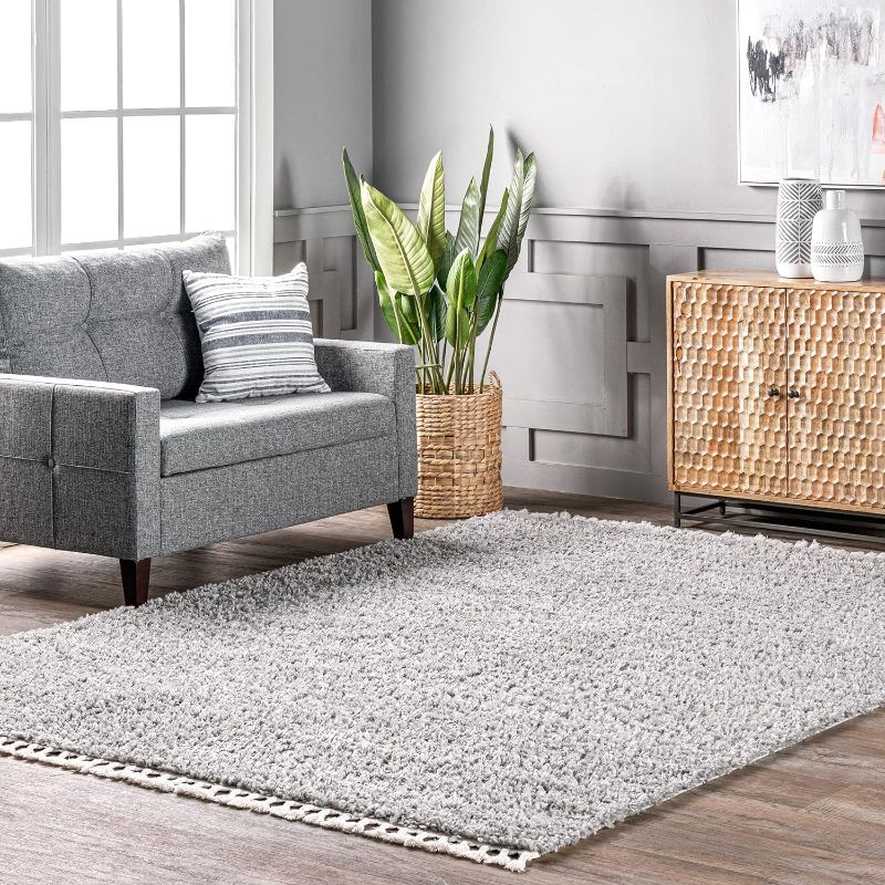 Photo 1 of 5' 3" x 7' 7" nuLOOM Neva Modern Tasseled Shag Area Rug, GRAY