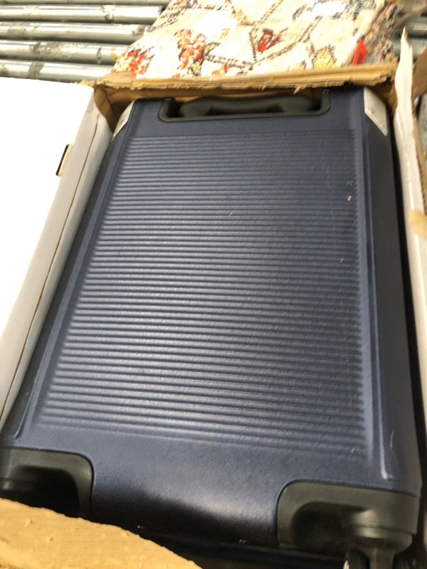 Photo 1 of 20 inch blue hard shell suitcase 