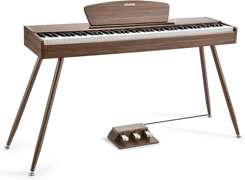 Photo 1 of 
Donner 88-Key Weighted Digital Piano with Sheet Music Stand, Triple Pedal, USB-MIDI - For Beginners, Walnut Wood