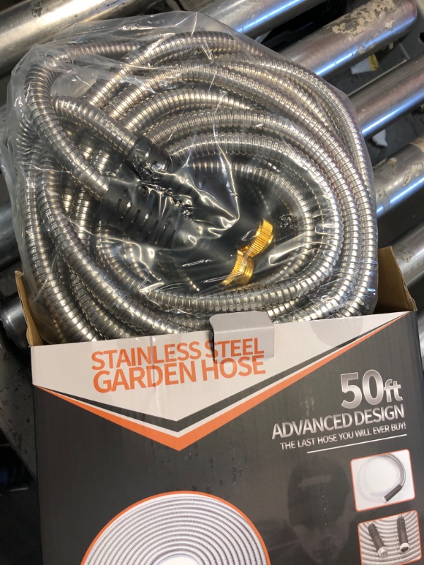 Photo 1 of 304 Stainless Steel Metal Garden Hose 50ft,Heavy Duty Water Hoses with 2 Sprayer Nozzles &3/4''Solid Fittings,Flexible,Lightweight,Kink Free&Tangle Free,Pet Proof,Puncture Proof pipe for Yard,Outdoor