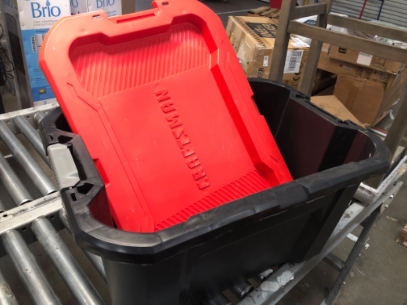 Photo 1 of 25 Gal. Latch and Stack Tote in Black with Red Lid
