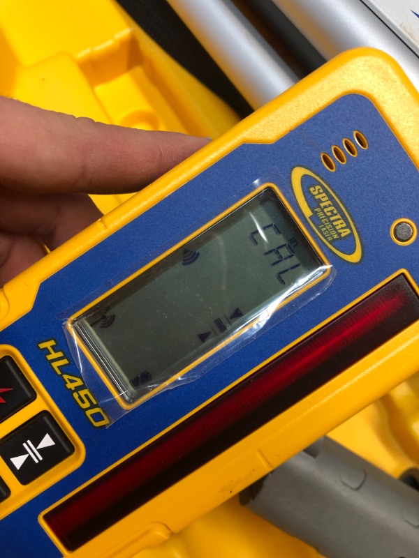 Photo 4 of ***USED - UNABLE TO TEST - POSSIBLY MISSING PARTS***
Spectra Precision LL300N-1 Laser Level, Self Leveling Kit with HL450 Receiver, Clamp, 15' Grade Rod / 10ths and Tripod , Yellow
