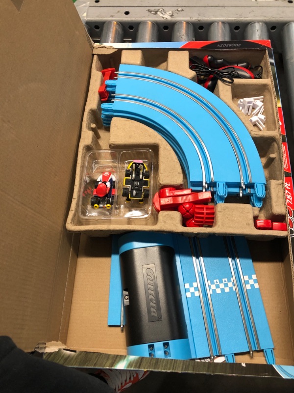 Photo 2 of Carrera First Mario Kart - Slot Car Race Track with Spinners - Includes 2 Cars: Mario and Peach - Battery-Powered Beginner Racing Set for Kids Ages 3 Years and Up Mario Kart w/ Peach