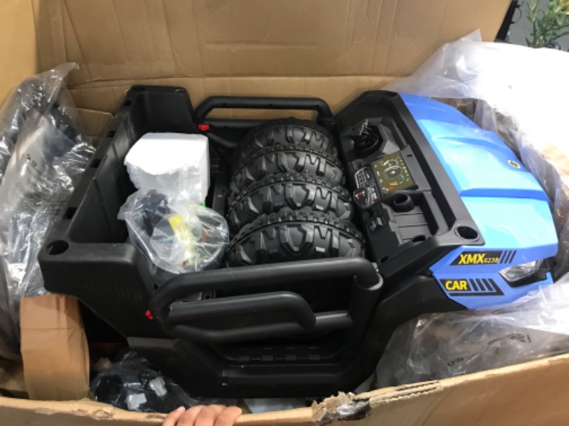 Photo 2 of *parts only* Ride On Dump Truck for Kids Ride On Car with Remote Control Electric UTV Vehicles with Electric Dump Bed, 4WD Power Ride-on 6 Wheels Ride On Toys for Boys Girls (Blue)