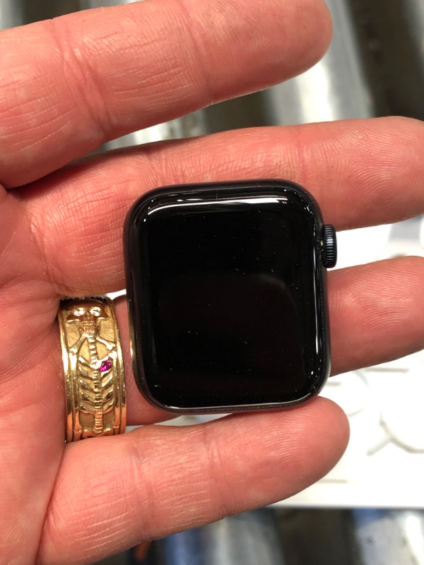 Photo 1 of Apple Watch SE (2nd Gen) [GPS 40mm] Smartwatch with Midnight Aluminum Case with Midnight Sport Loop. Fitness & Sleep Tracker, Crash Detection, Heart Rate Monitor, Carbon Neutral
