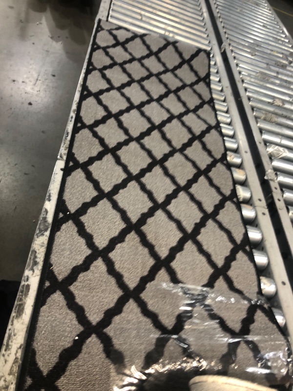 Photo 1 of 19" x  58  grey / black area rug 