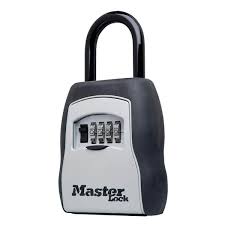 Photo 1 of **UNKNOWN LOCK COMBO**
Master Lock Lock Box, Resettable Combination Dials, Black and Grey
