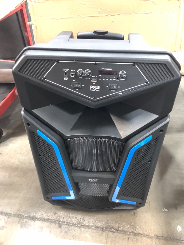 Photo 2 of PYLE Portable Bluetooth PA Speaker System - 1200W Outdoor Bluetooth Speaker Portable PA System w/ Microphone In, Party Lights, MP3/USB SD Card Reader FM Radio, Rolling Wheels - Mic, Remote PPHP152SM
