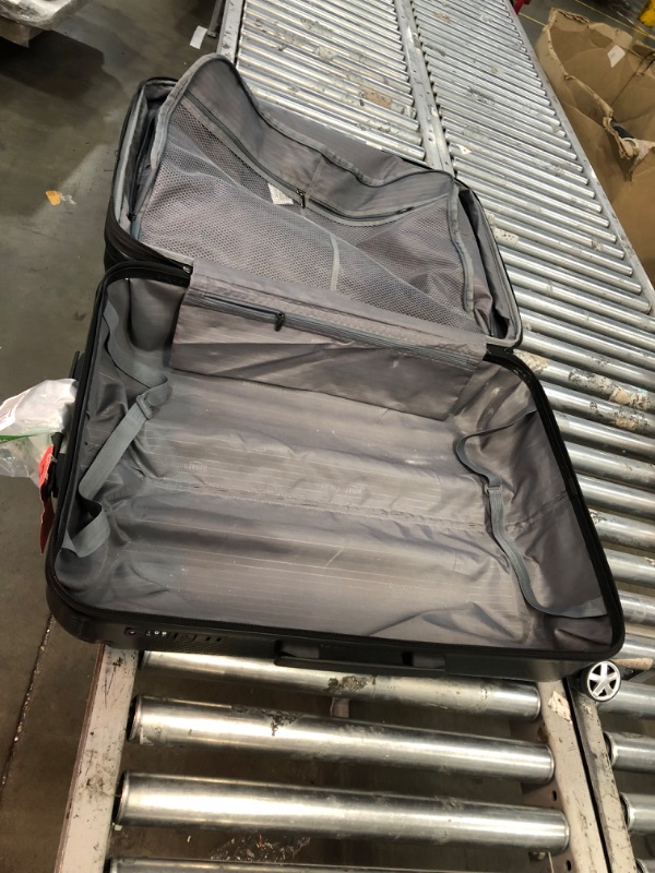 Photo 3 of Amazon Basics Oxford Expandable Spinner Luggage Suitcase with TSA Lock - 30.1 Inch, Black Black 30.1-inch Solid