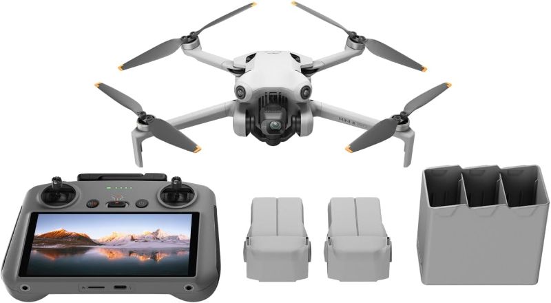 Photo 1 of DJI Mini 4 Pro Fly More Combo Plus with DJI RC 2, Mini Drone with 4K HDR Video, 3 Intelligent Flight Battery Plus for up to 135 Mins Flight Time, Smart Return to Home, Drone with Camera for Beginners
