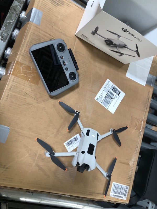 Photo 2 of DJI Mini 4 Pro Fly More Combo Plus with DJI RC 2, Mini Drone with 4K HDR Video, 3 Intelligent Flight Battery Plus for up to 135 Mins Flight Time, Smart Return to Home, Drone with Camera for Beginners
