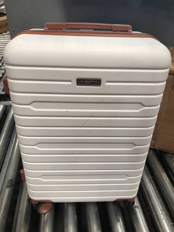 Photo 2 of **MINOR DAMAGE SCRATCHES ON ITEM**
FIGESTIN Carry on luggage with Spinner Wheels, Hardside Lightweight 20in carry on suitcase checked luggage TSA Lock(Beige) Beige with Brown