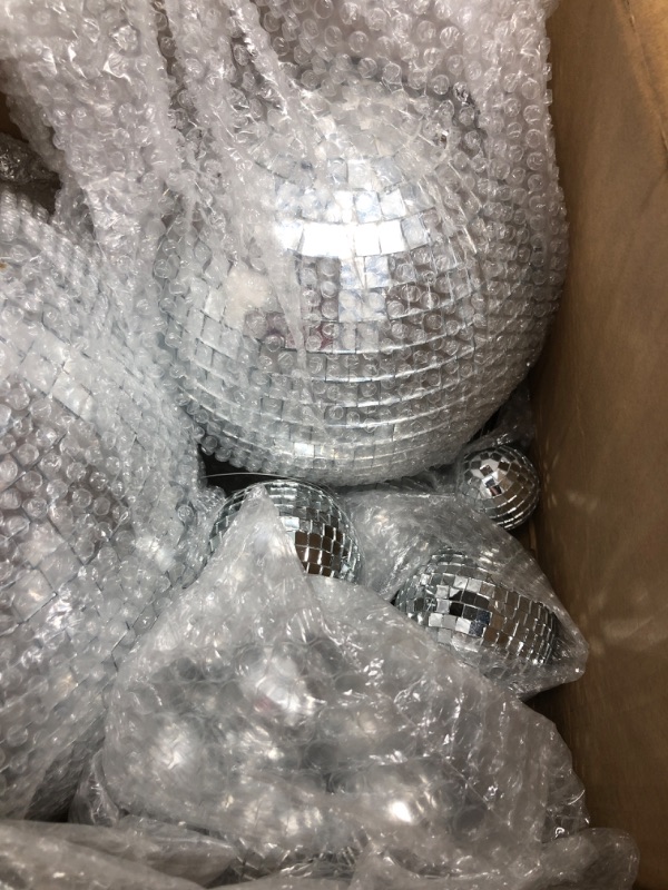 Photo 2 of  Mirror Disco Balls Ornaments Different Sizes Bulk Reflective Mini Disco Ball Decorations 70s Disco Themed Party Decoration for Christmas Wedding Party Ornaments (12/6/ 4/3.2/2/ 1.2 in) 12/ 6/ 4/ 3.2/ 2/ 1.2 In 1 of 2 