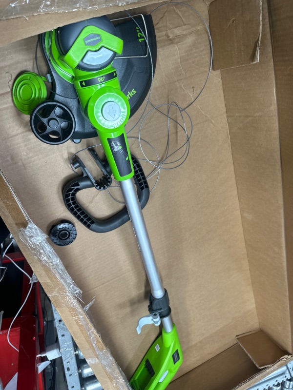 Photo 2 of ***Parts Only***Greenworks 24V 12" Cordless String Trimmer / Edger, 2.0Ah Battery and Charger Included