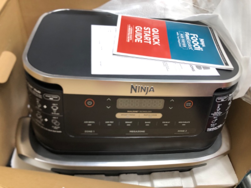 Photo 1 of Ninja DZ071 Foodi 6-in-1 FlexBasket Air Fryer with 7-QT MegaZone & Basket Divider for Large Proteins & Full Meals, Smart Finish Cook 2 Foods 2 Ways, Family Sized Capacity, Air Fry, Roast & More, Black