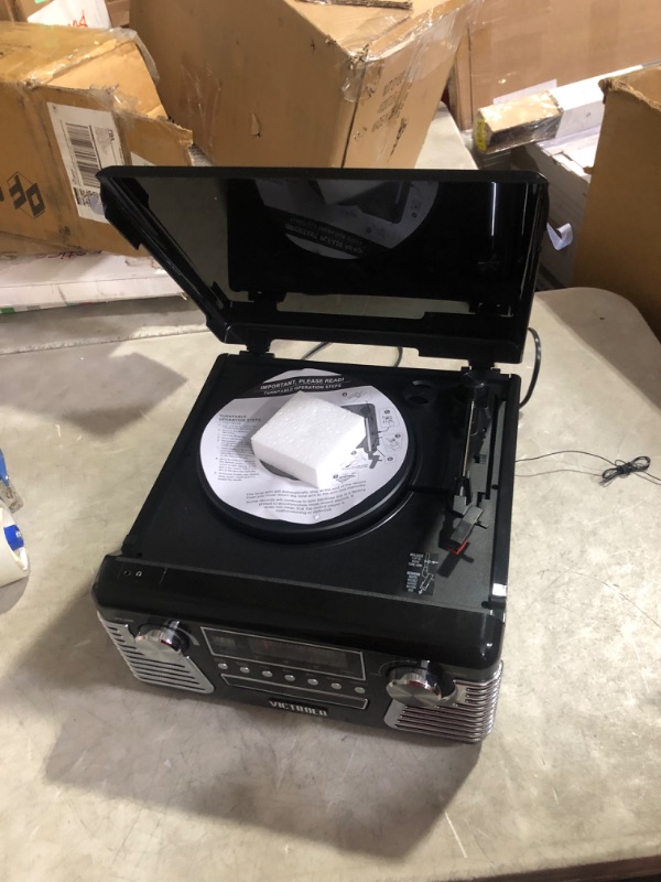 Photo 3 of **FUNCTIONAL TURNS ON BUT NO SOUND COMES OUT NEEDS WIRING TO FIX, PARTS ONLY** Victrola 50's Retro Bluetooth Record Player & Multimedia Center, Black & Vintage Vinyl Record Storage and Carrying Case, Fits All Standard Records - 33 1/3, 45 and 78 RPM, Hold