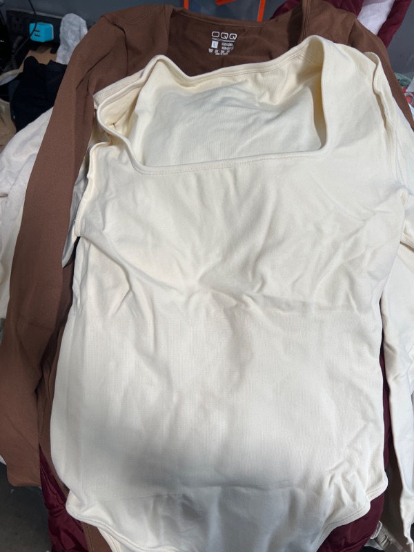 Photo 1 of 2 large beige and brown body suit